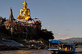 Buddha statue in the small village of Sop Ruak, on the Thai shore of the Mekong, Northern Thailand. 